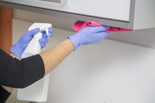Cleaner using equipment with attention to slip and trip hazards