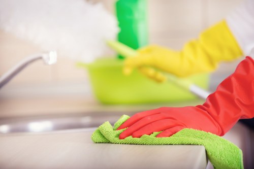 Local carpet cleaning service preparing a room for steam cleaning